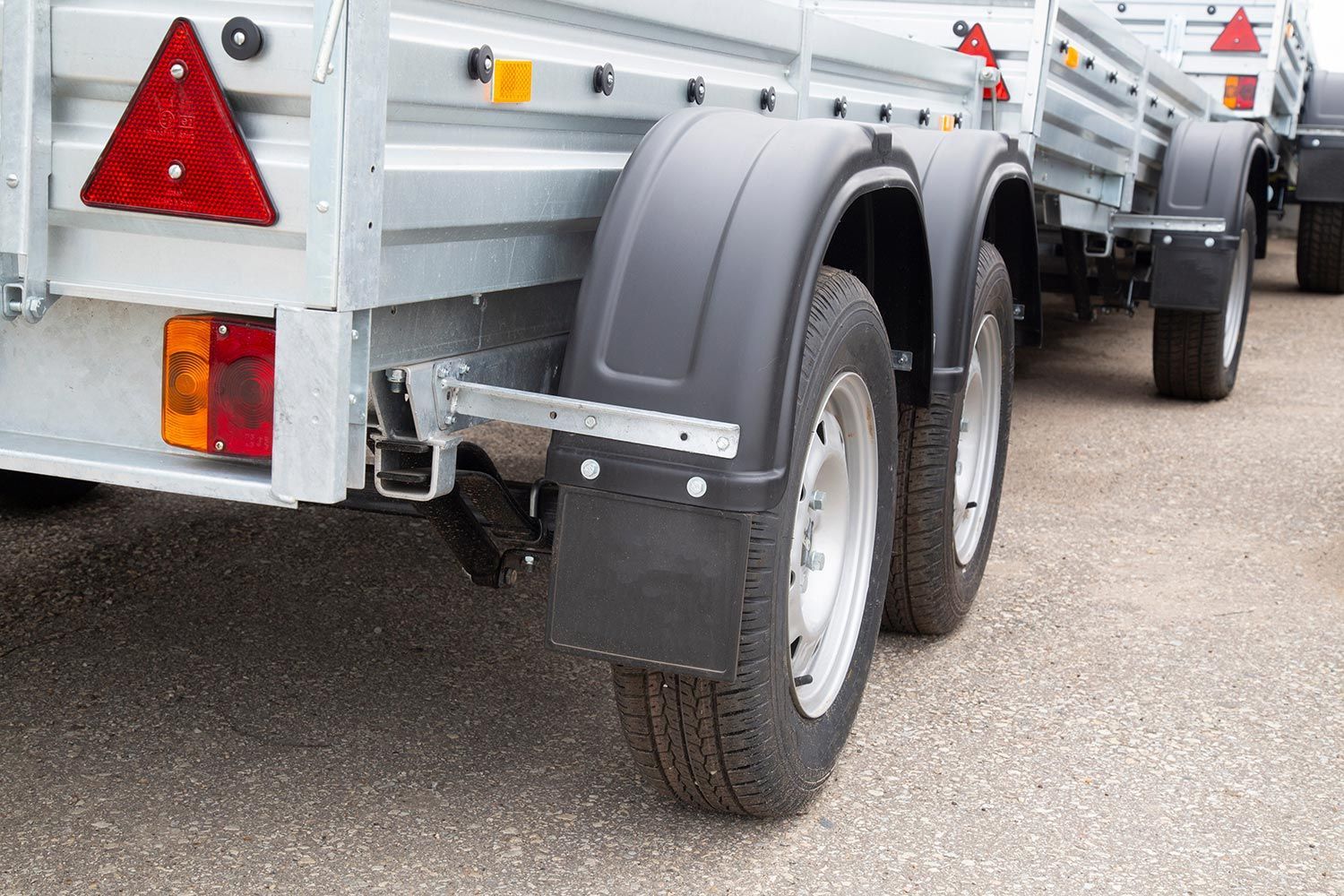 Utility trailers displayed in the shop