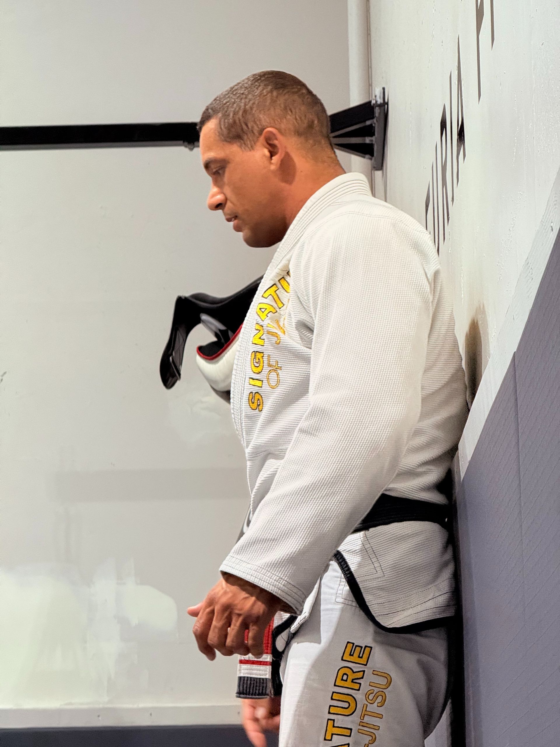 Adult students drilling grappling fundamentals at Signature of Jiu-Jitsu in Belmont, CA, building calm strength.