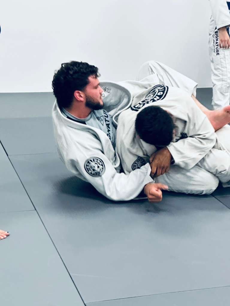Students training Brazilian Jiu-Jitsu at Signature of Jiu-Jitsu in Belmont, CA for full-body wellness and confidence
