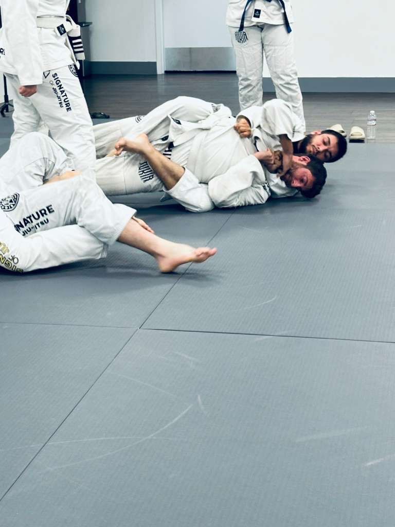 Beginners training Jiu-Jitsu at Signature of Jiu-Jitsu in Belmont, CA, building strength, skills, and confidence