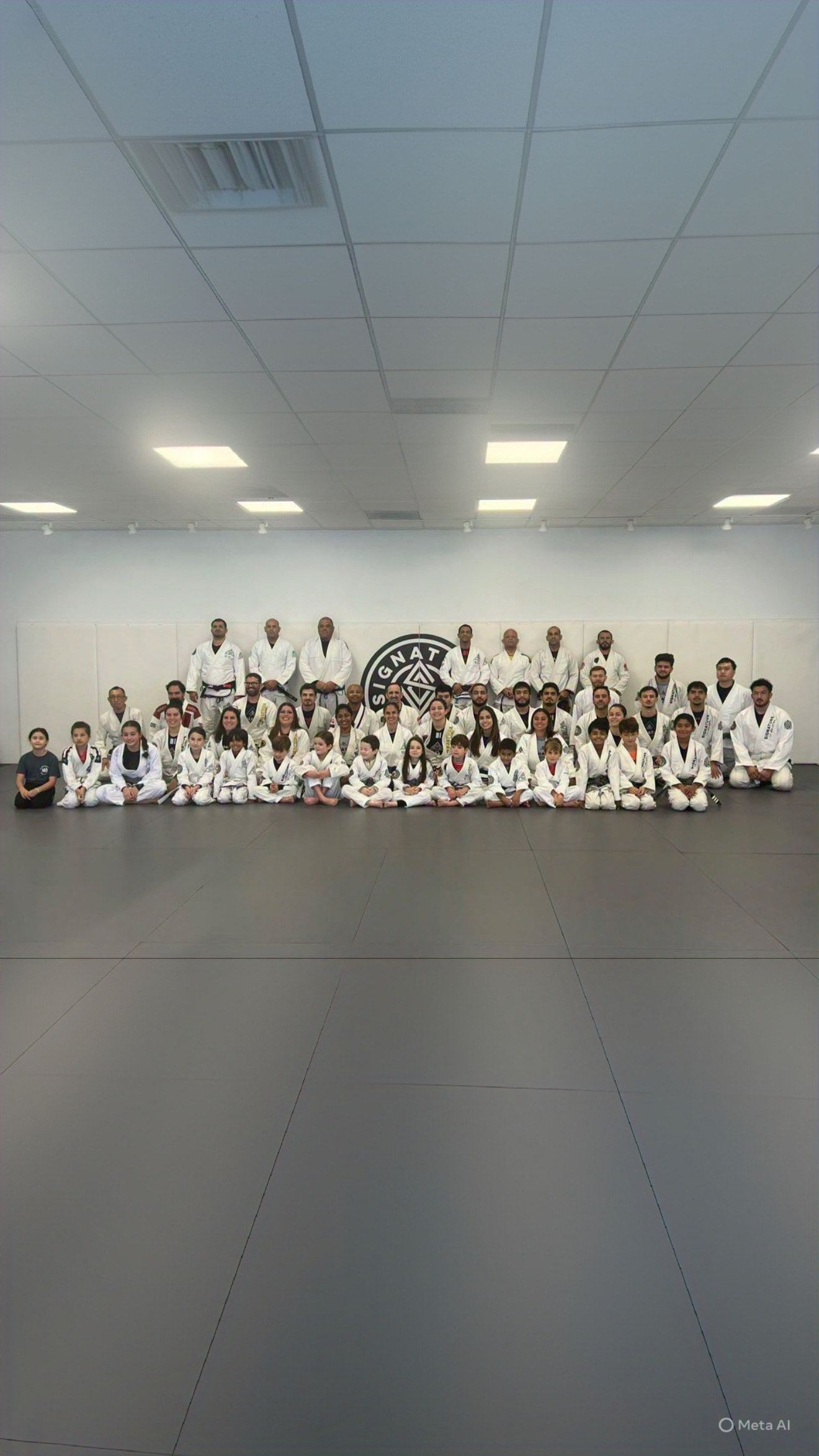 Kids practice controlled grappling in Youth Jiu-Jitsu class at Signature of Jiu-Jitsu in Belmont, CA, building focus.