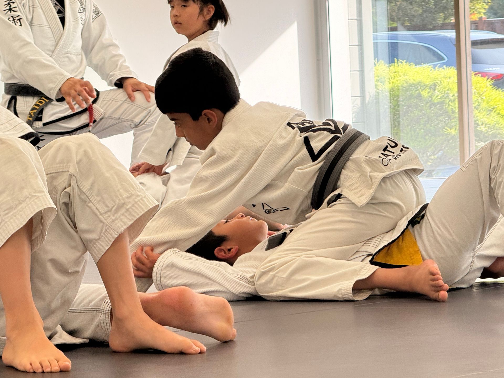 Kids practicing Youth Jiu-Jitsu drills at Signature of Jiu-Jitsu in Belmont, CA, building focus and confidence