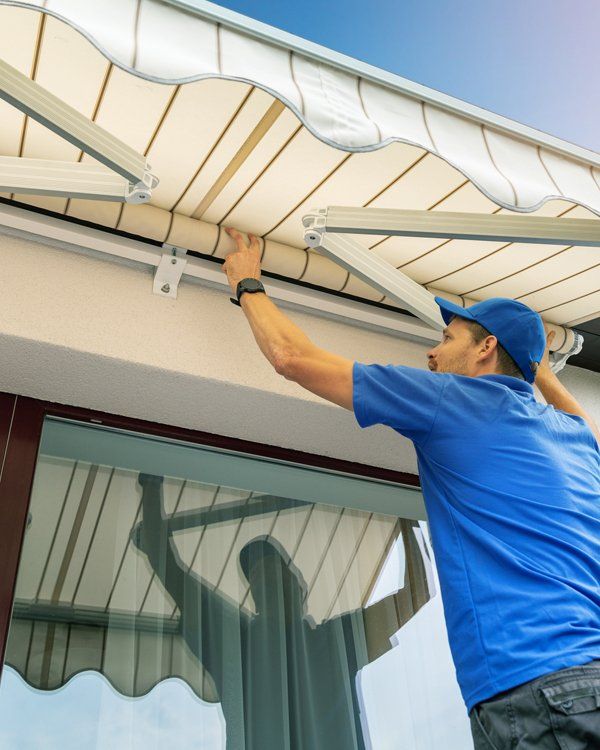 Installing Awnings — Roseville, MI — J.C. Goss Company