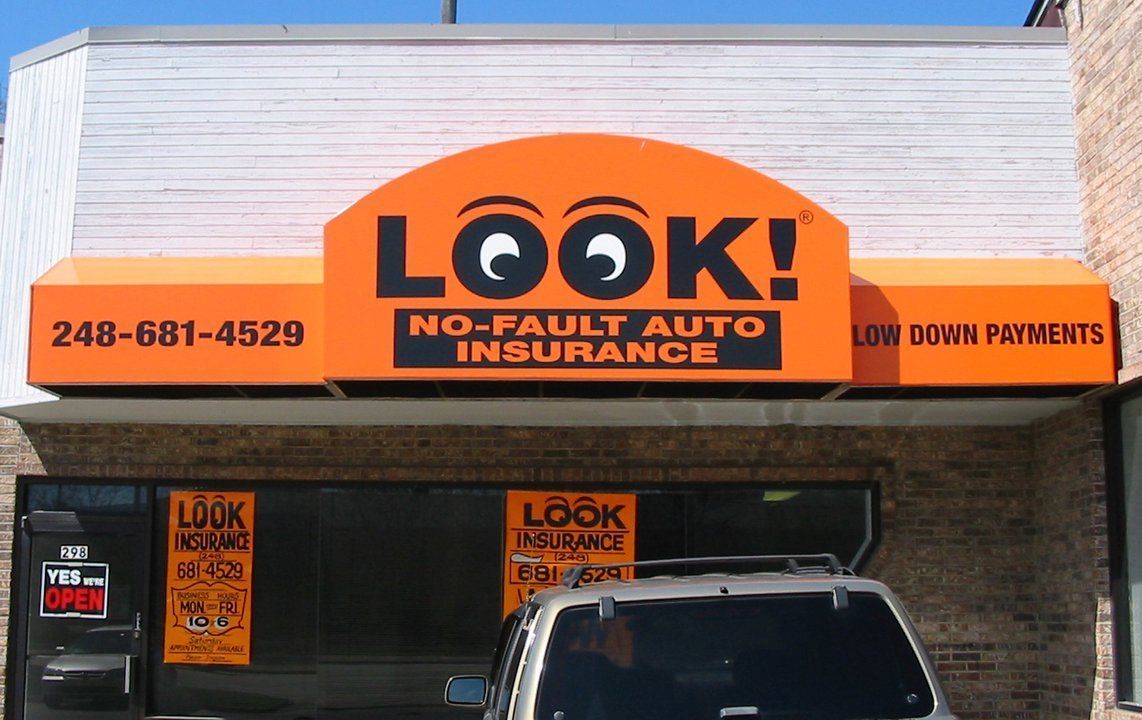 Orange Metal Awning — Roseville, MI — J.C. Goss Company