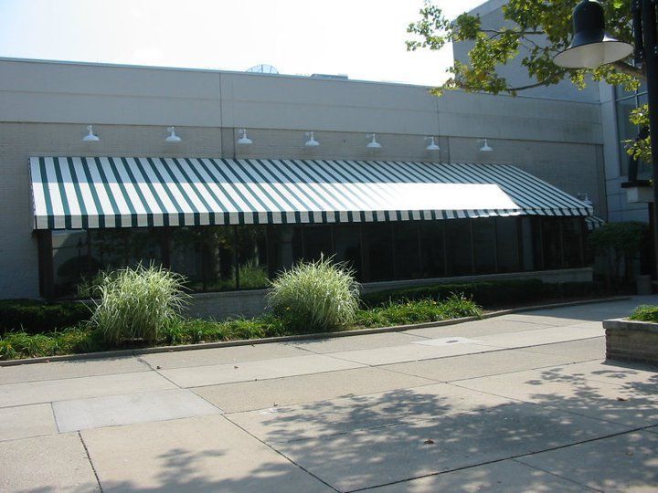 Wide Green Stripes Awning — Roseville, MI — J.C. Goss Company