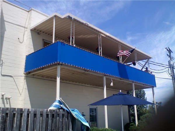 Blue Side Cover — Roseville, MI — J.C. Goss Company