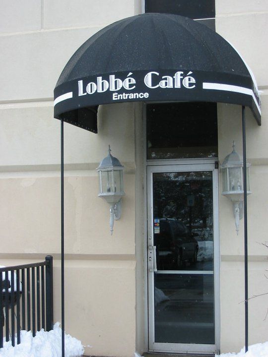 Simple Black Door Awning — Roseville, MI — J.C. Goss Company