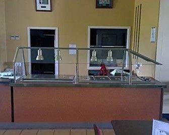 A Buffet Line In A Restaurant With A Picture On The Wall Above It — Maryborough Cricket Club In Maryborough, QLD