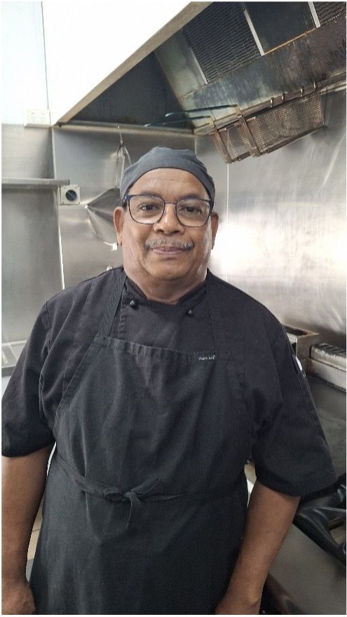 A Man In A Black Chef Uniform Is Standing In A Kitchen— Maryborough Cricket Club In Maryborough, QLD