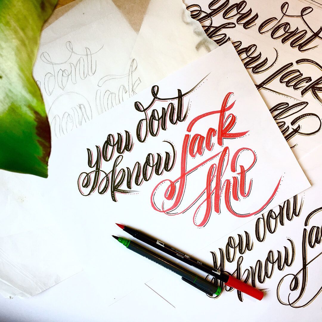 Hand-lettered papers with 