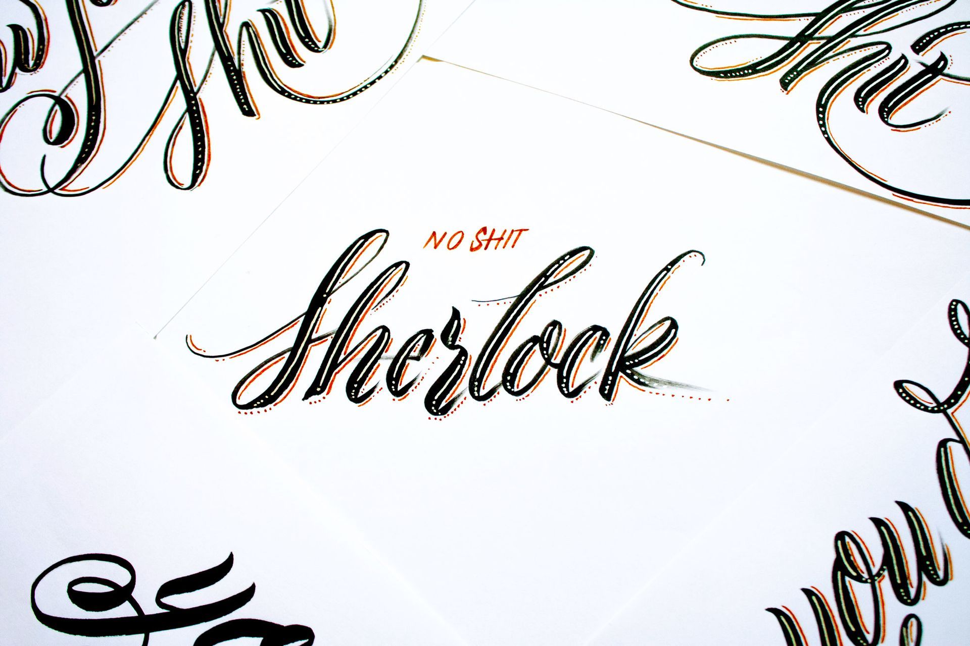 Artistic calligraphy on white paper featuring the centered, scripted word 