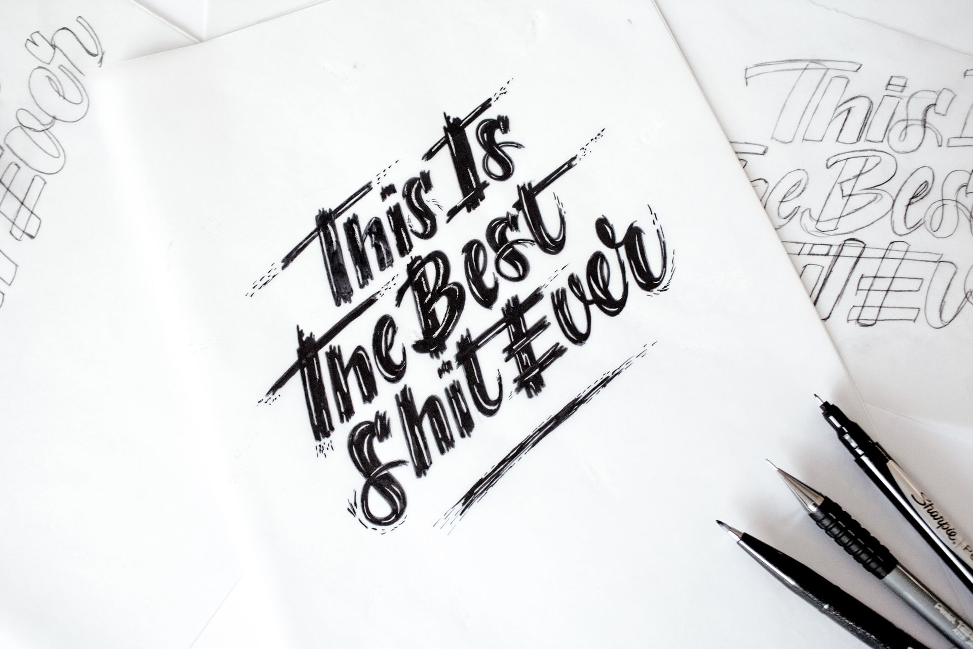 Calligraphy in black ink on white paper reads