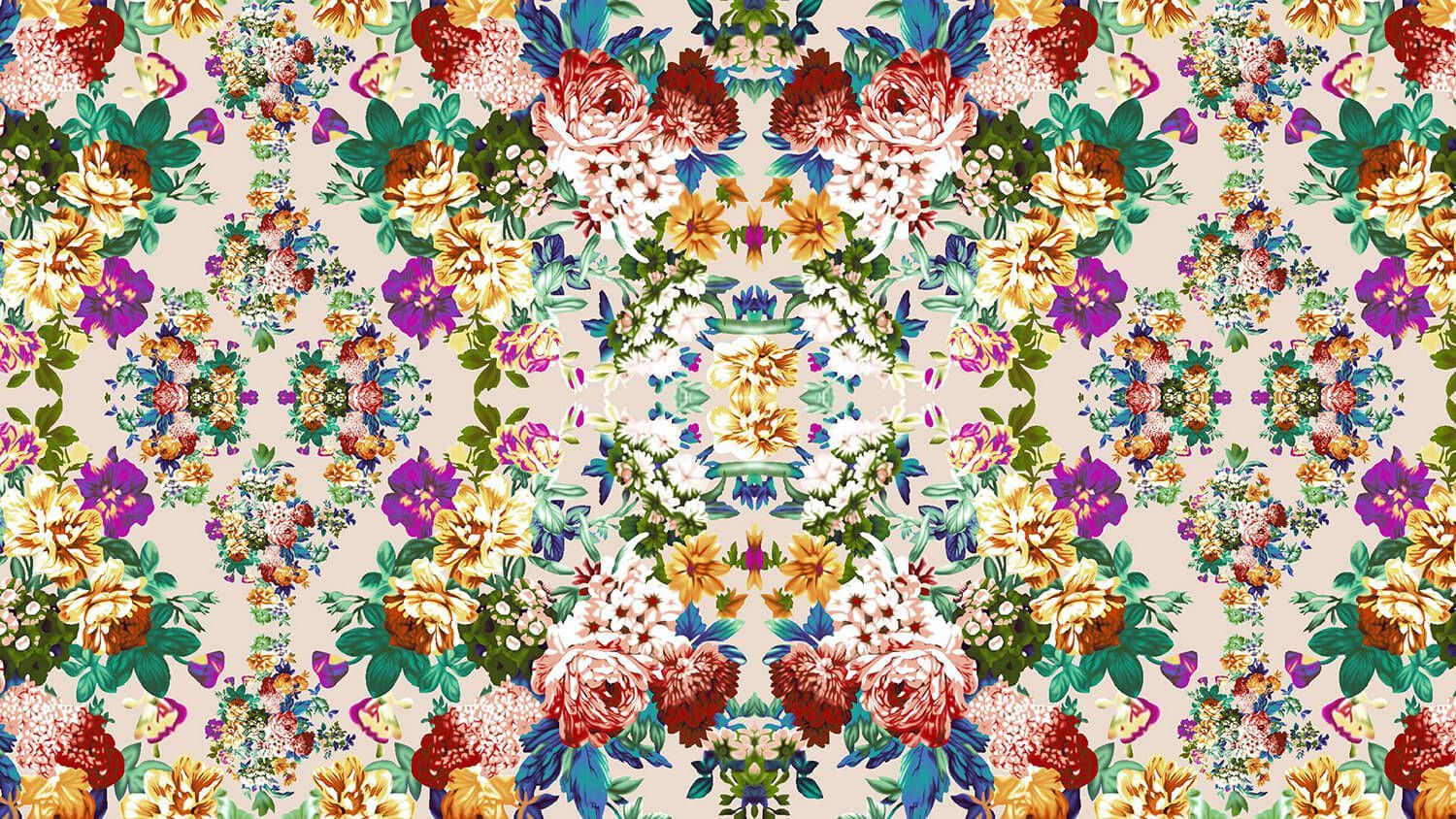 Colorful mirrored floral pattern with pink, green, blue, and gold blossoms on a cream background