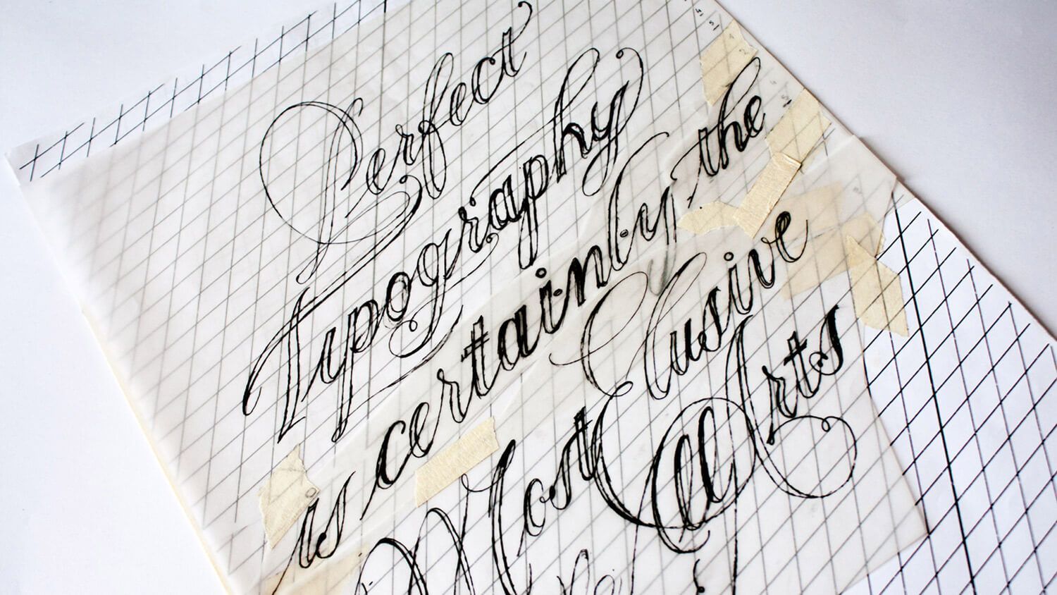 Handwritten calligraphy on graph paper, with cursive black ink and a pale yellow background.