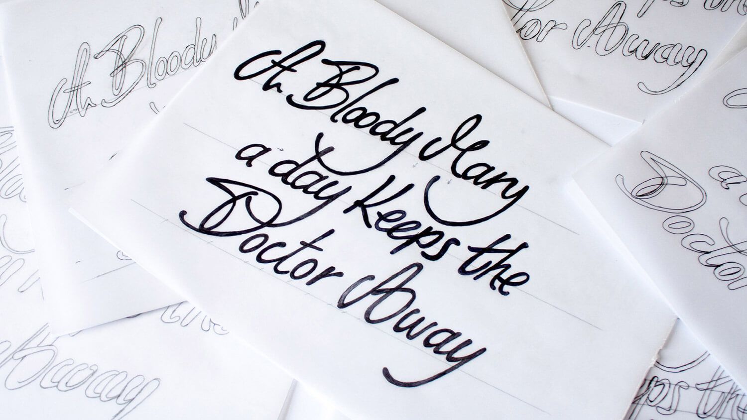 Calligraphy on white paper with the quote, “A doctor keeps the body away, but a priest keeps the doctor away.”