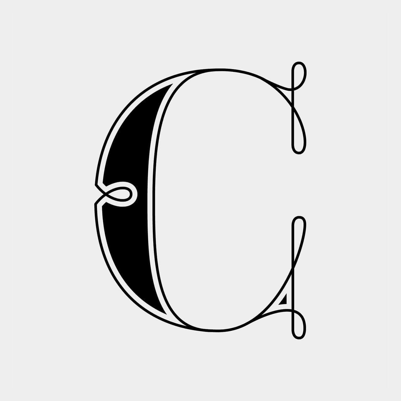 Green Fairy Font. Stylized black-and-white letter C with decorative curved lines