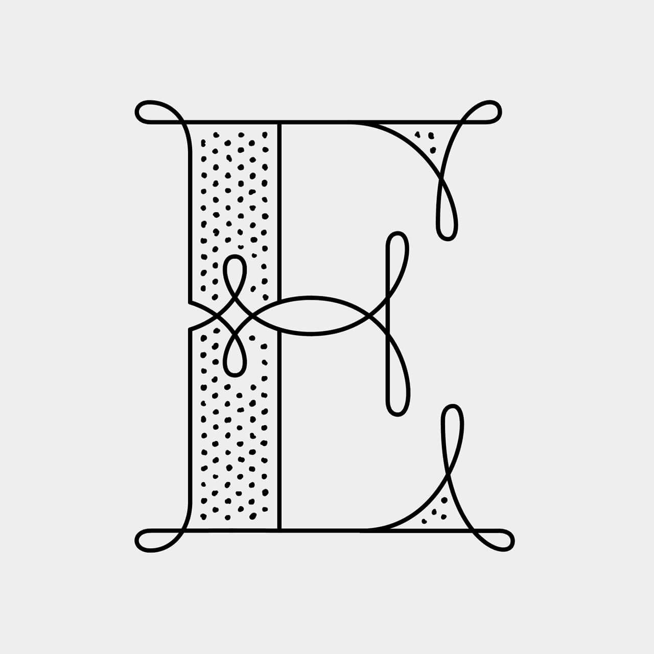 Green Fairy Font. Stylized black letter E with dotted left stem on a light gray background