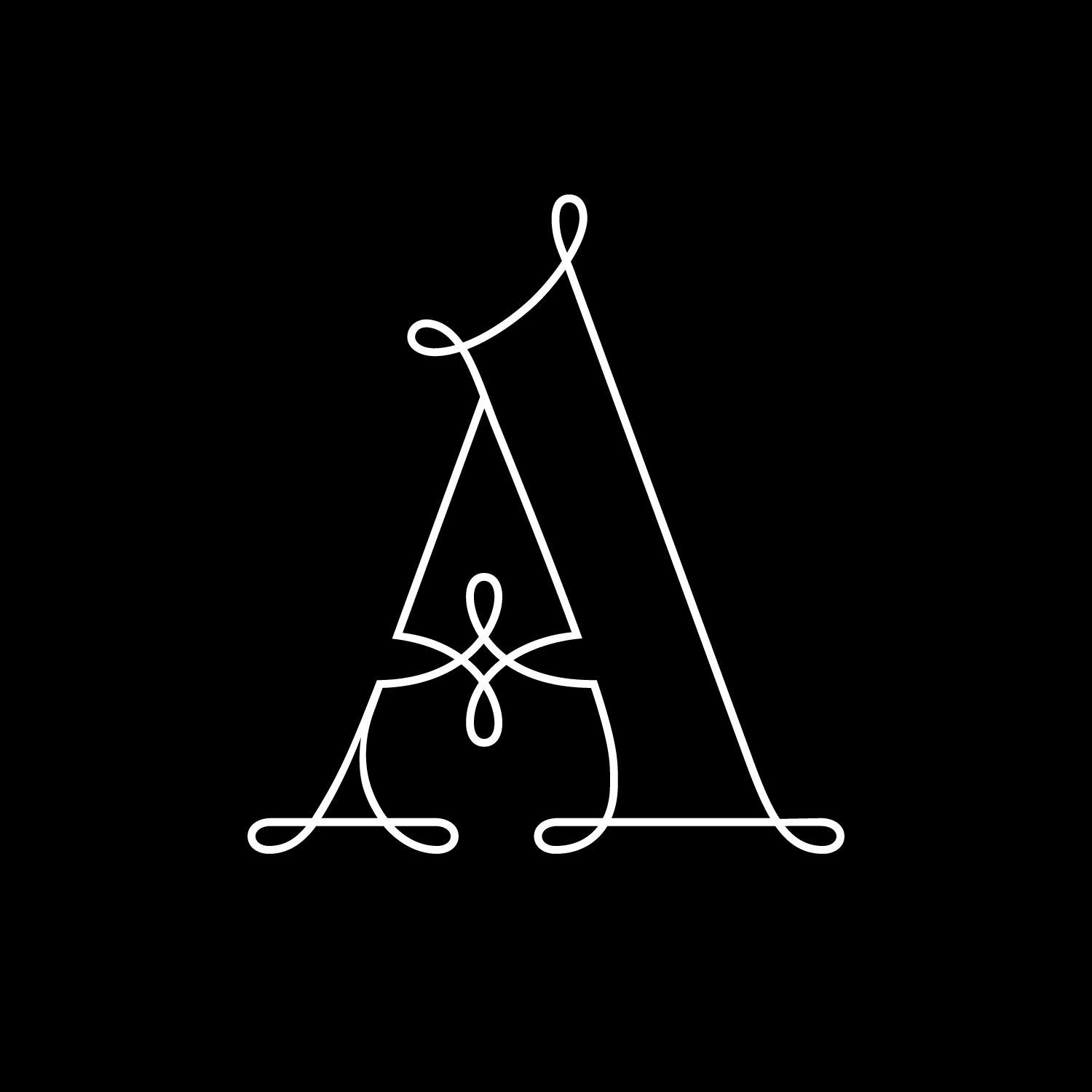 White calligraphic letter “A” on a black background.