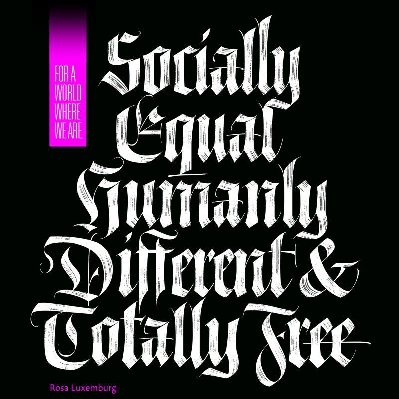 Stylized white gothic text: “Socially Equal Humanly Different & Totally Free” by Rosa Luxemberg