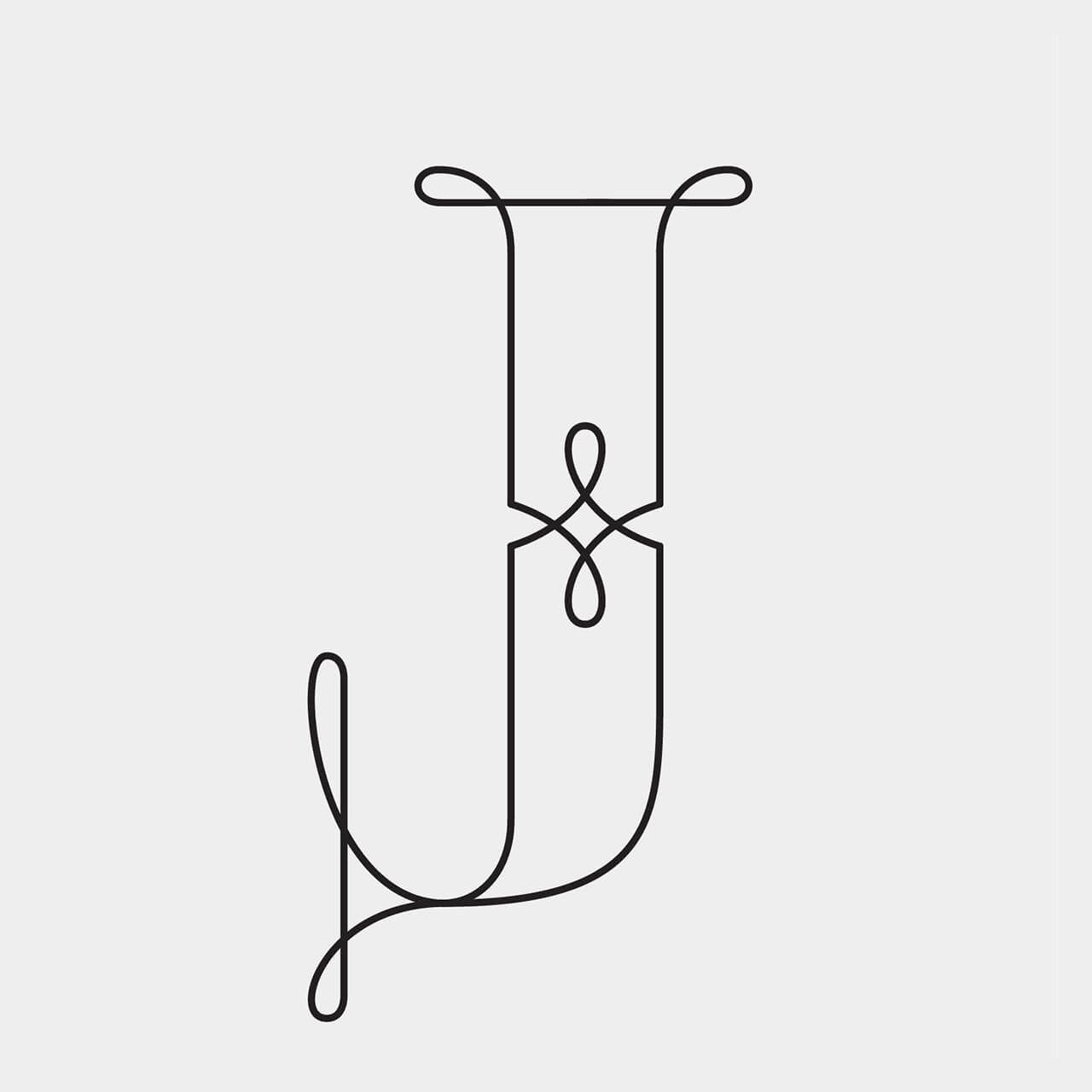 Green Fairy Font. Minimal black line drawing of a stylized letter J with decorative loops on a light gray background