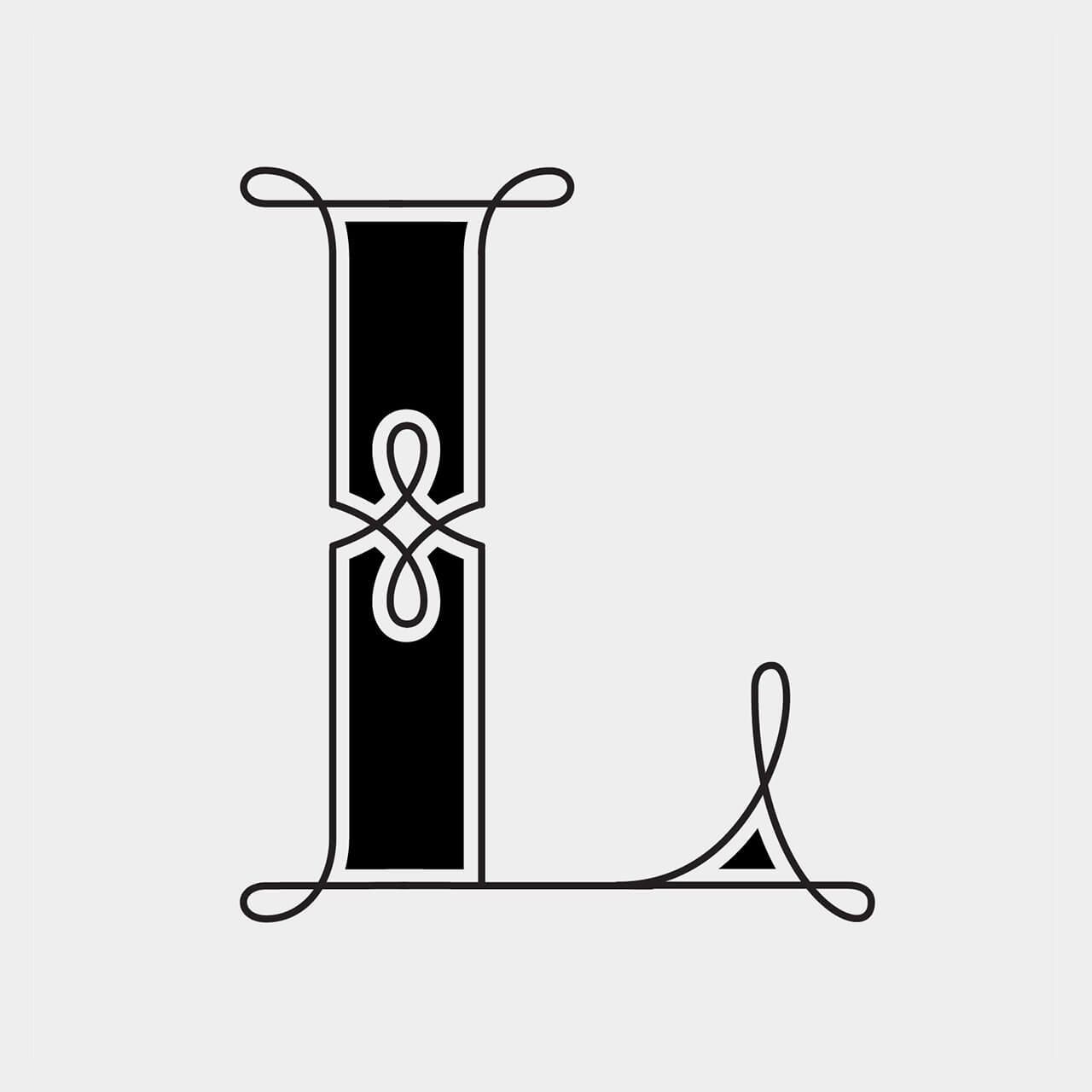 Green Fairy Font. Black decorative monogram letters L and J intertwined on a light background