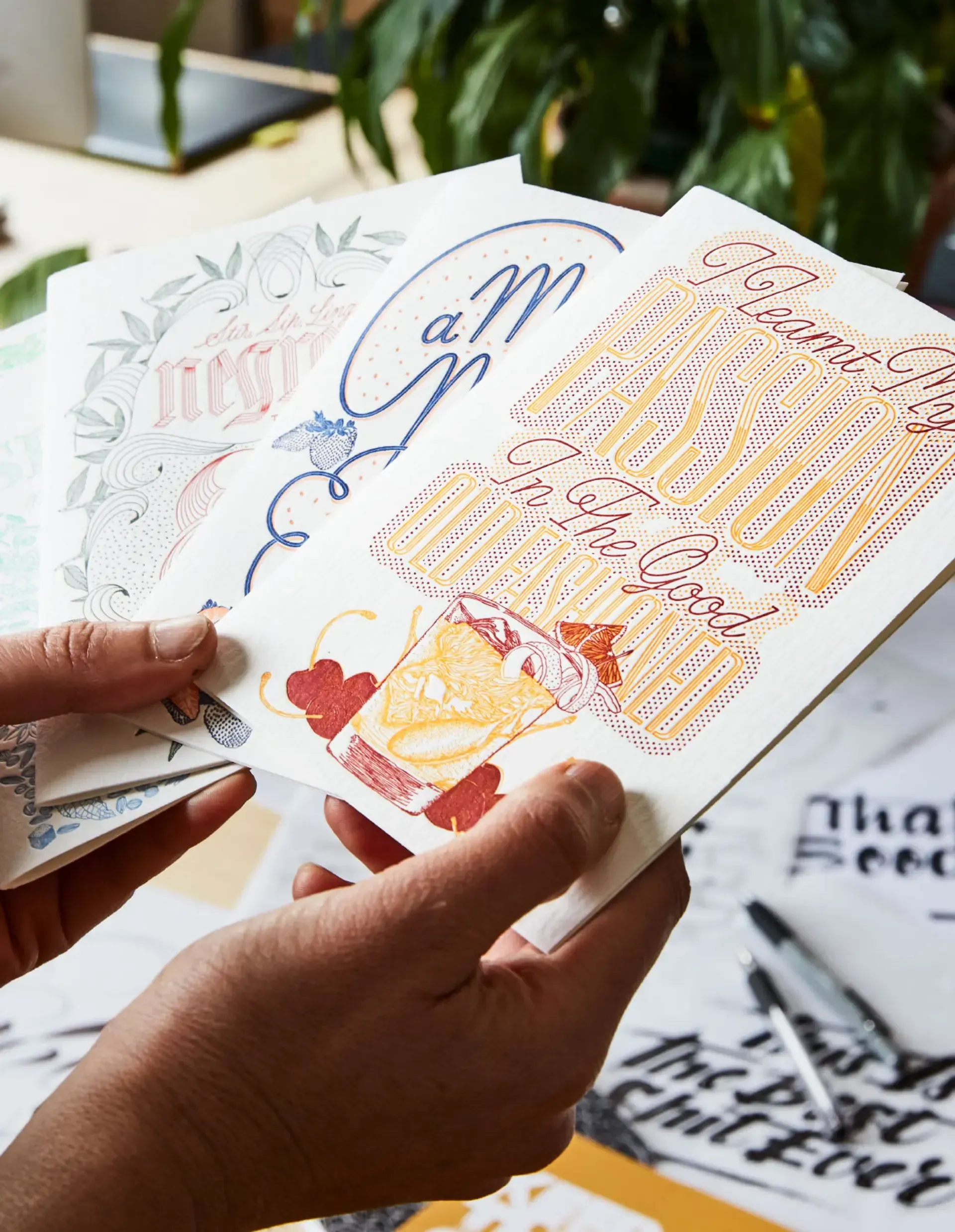Four pastel religious wall art prints with floral and script designs on a white background