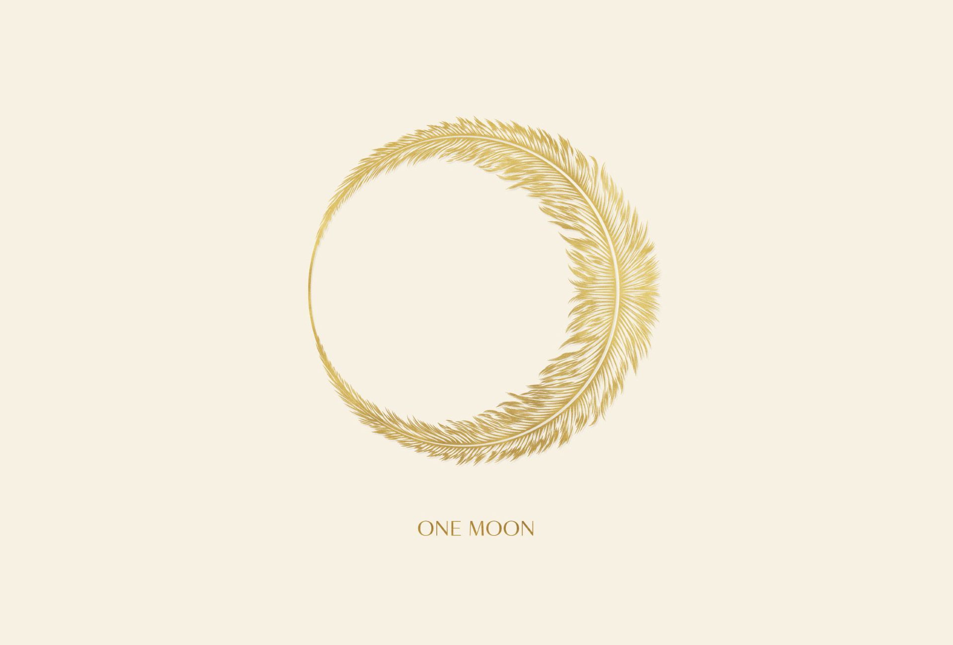 A gold, ornate crescent moon made of intricate floral and leaf patterns set against a soft cream background.