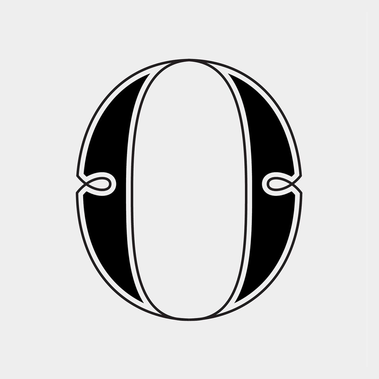 Green Fairy Font. Black-and-white oval sports ball logo with vertical white panels and side laces