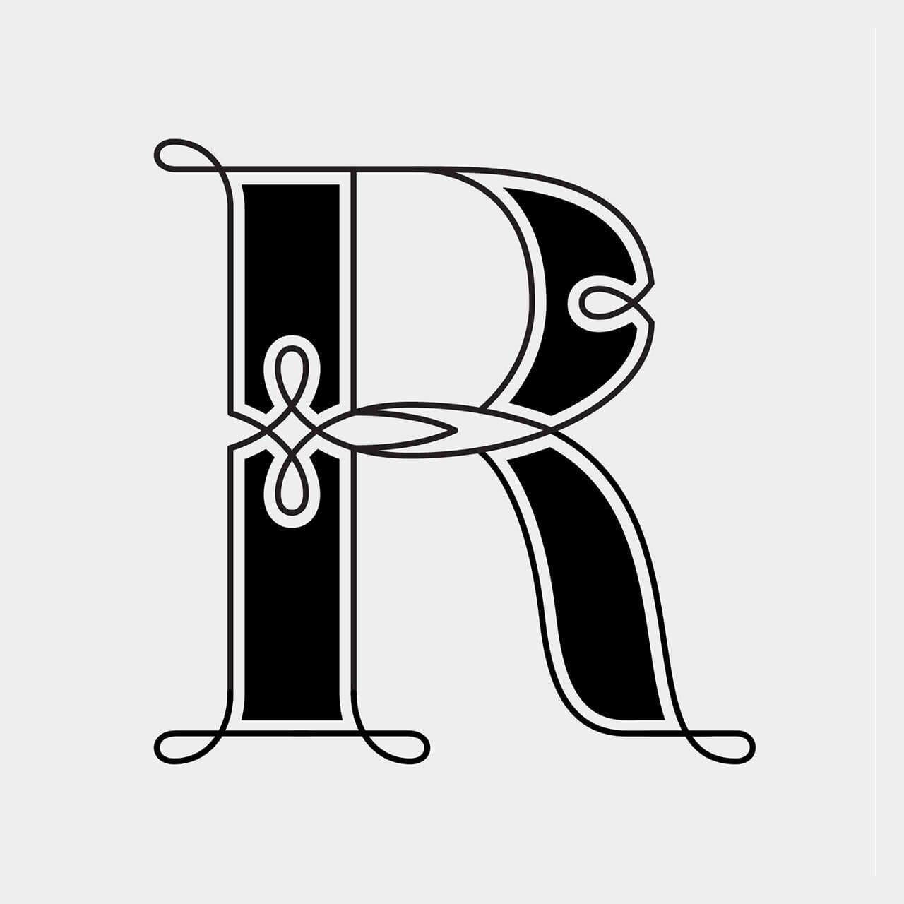 Green Fairy Font. Black-and-white decorative capital R with ornate serif details and a ribbon-like flourish