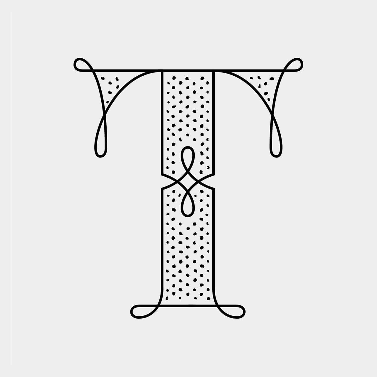 Green Fairy Font. Stylized black-and-white monogram logo with an ornate T-like letter design and linked center shapes