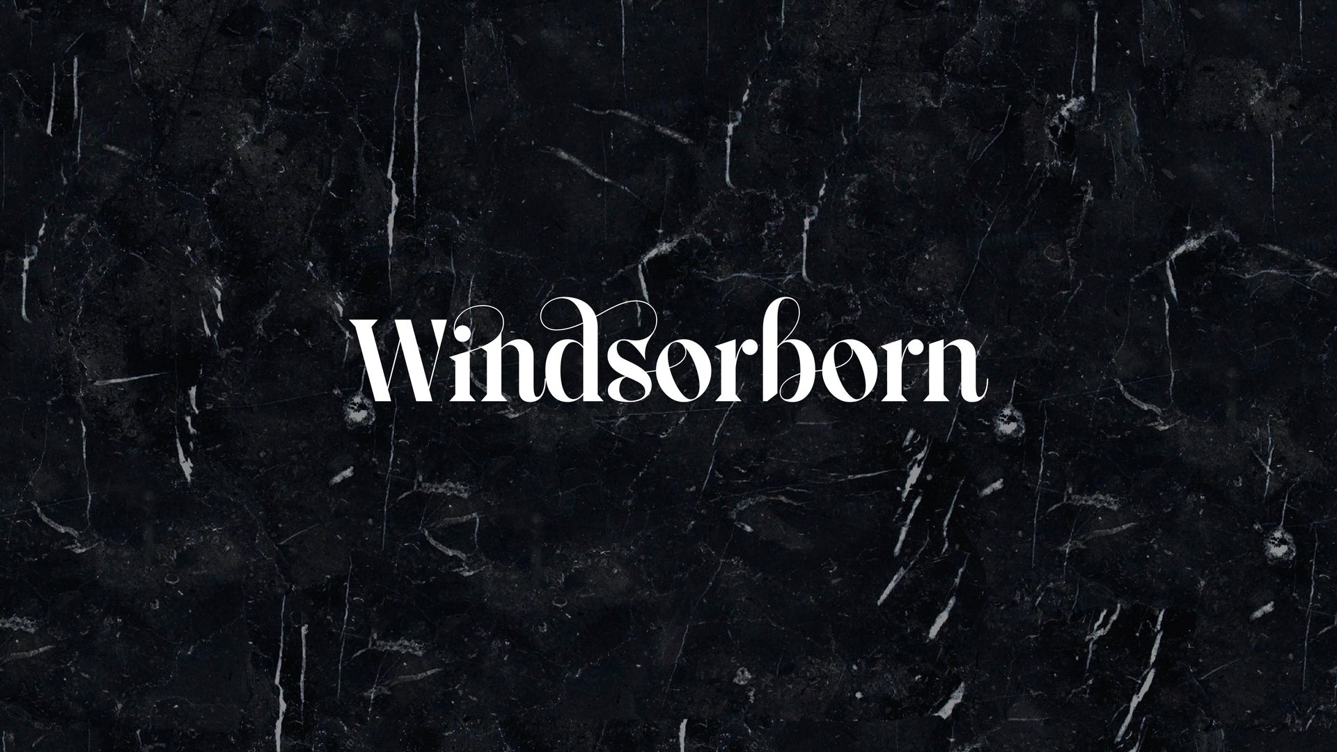White “Windsorborn” text centered on a dark, textured background.