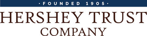 Logo for Hershey Trust Company, featuring dark text on a white background with