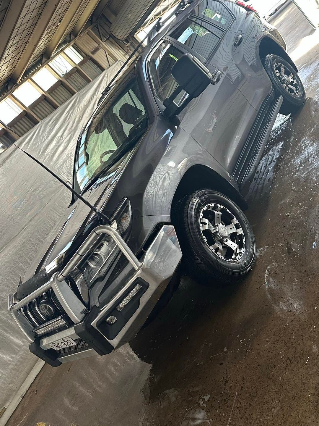 Silver SUV with Front End Damage Parked in A Garage — Diamond Glow Auto Detailing in Armidale, NSW