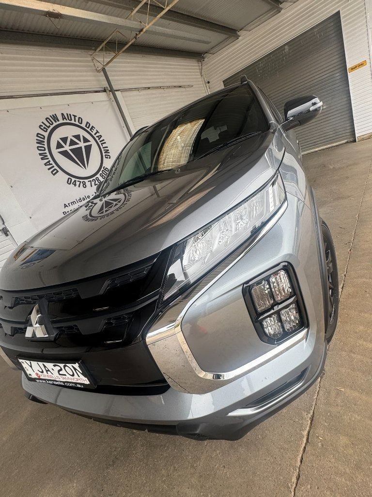 Silver Mitsubishi SUV Parked in A Covered Garage — Diamond Glow Auto Detailing in Armidale, NSW