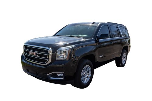 A black gmc yukon is shown on a white background.