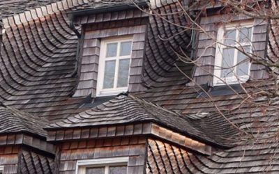 Historic roofing with rotting siding and shingles