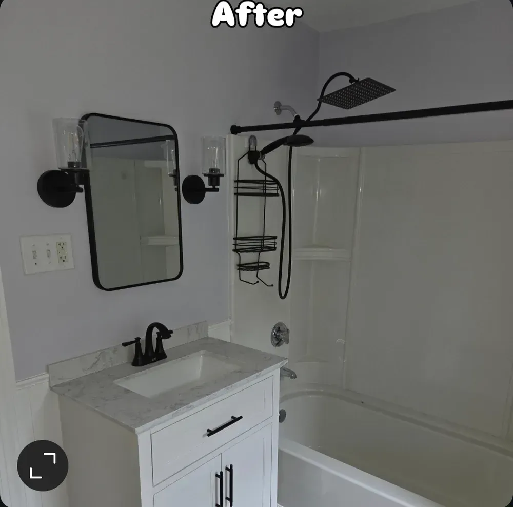 Bathroom vanity with mirror and black fixtures beside a tub and showerhead, labeled “After”