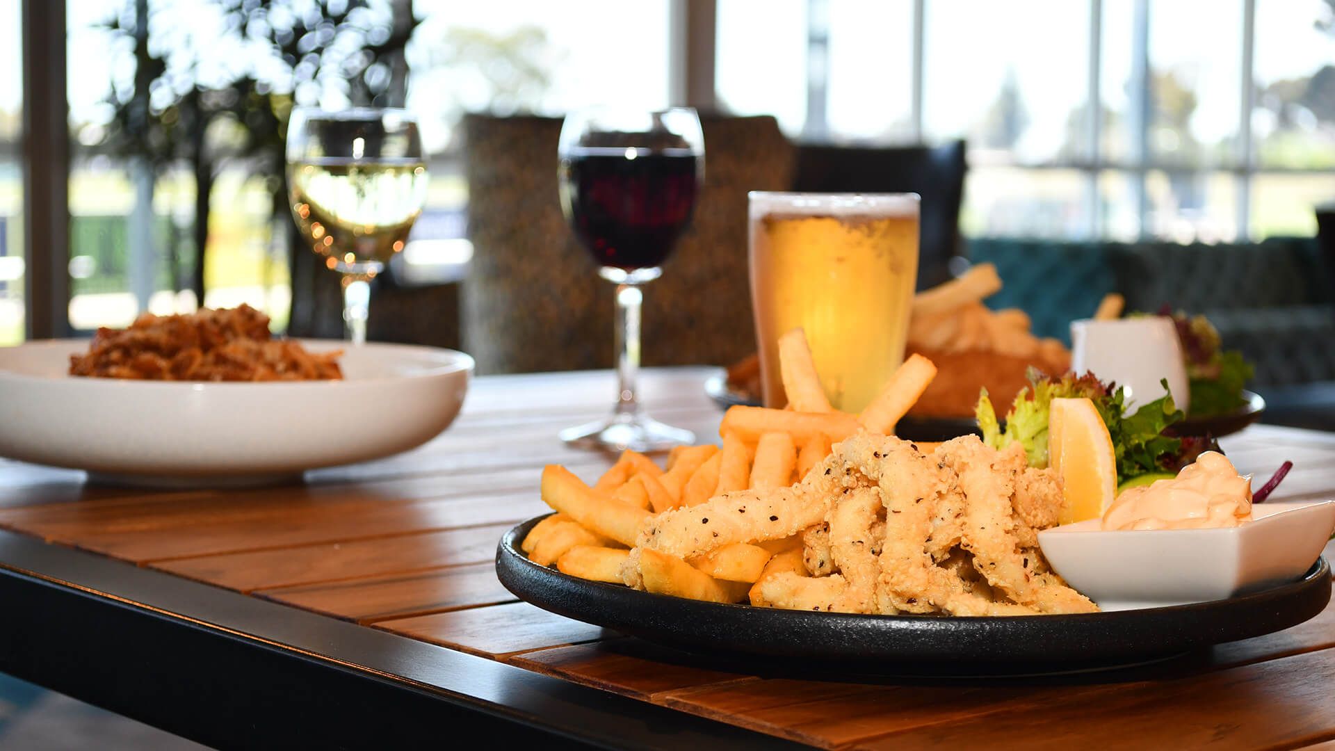Enjoying a meal in the Bistro at Hoppers Crossing Sports Club