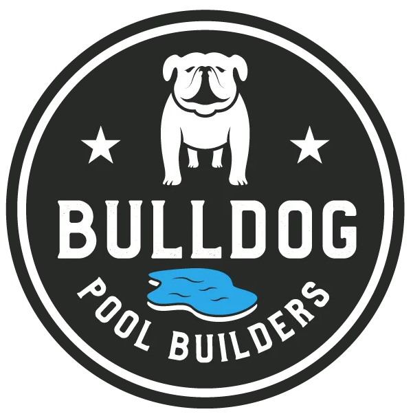 Logo of Bulldog Pool Builders: white bulldog above text and pool outline on black circle.