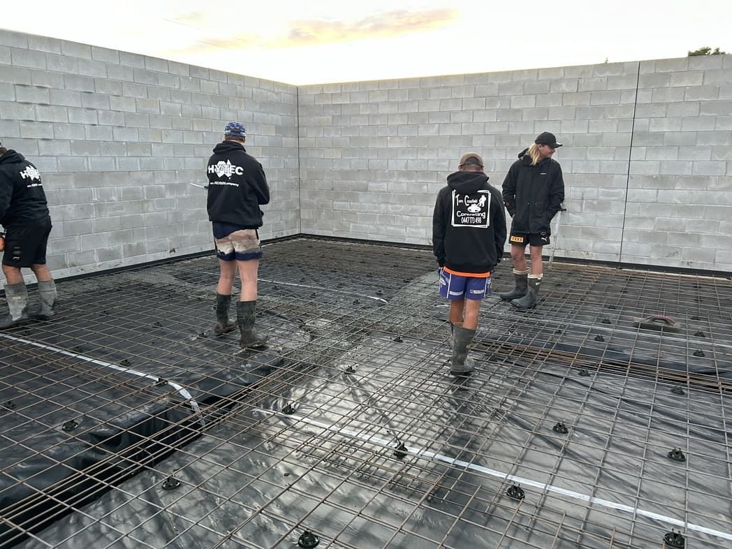 newly poured and compacted concrete slab on A Construction Site — J’s Concreting & Carpentry in Kew, NSW