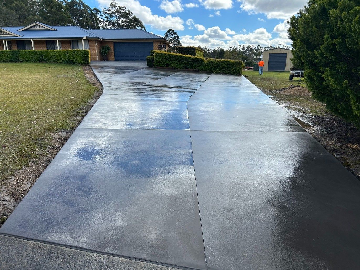 A Wooden Fence Is Being Built in Front of A House — J’s Concreting & Carpentry in Kew, NSW