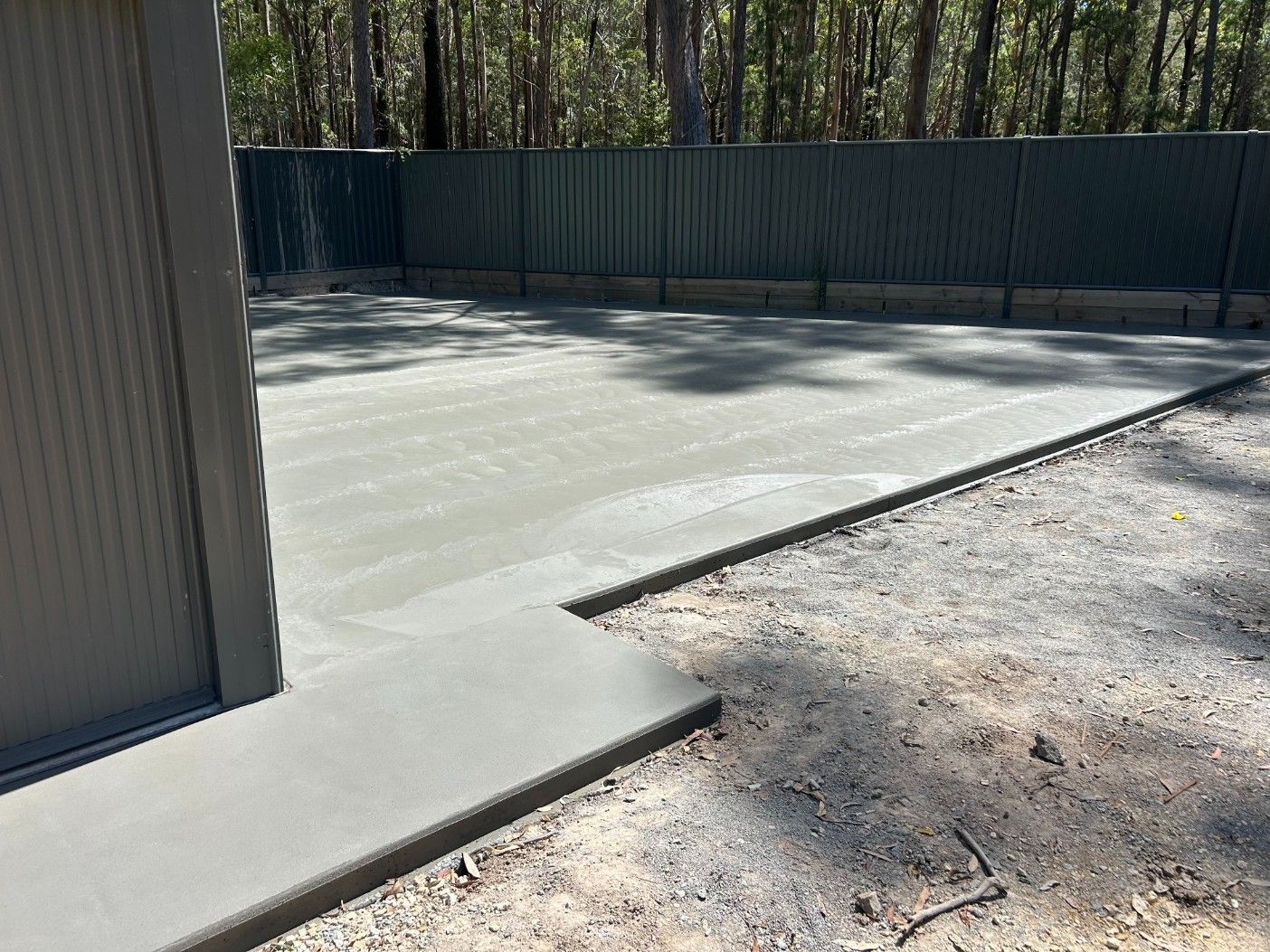 Wooden Joists Arranged Across a Black Plastic Floating Dock — J’s Concreting & Carpentry in Kew, NSW