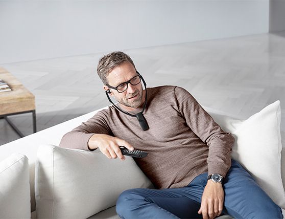 man with smart listening device