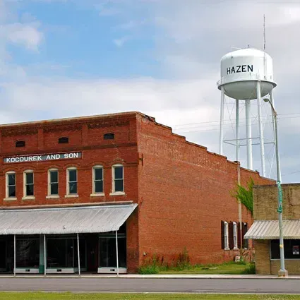 Hazen AR Criminal Lawyers A brick building with a water tower that says hazen on it