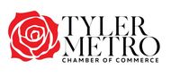 The tyler metro chamber of commerce logo has a red rose on it.
