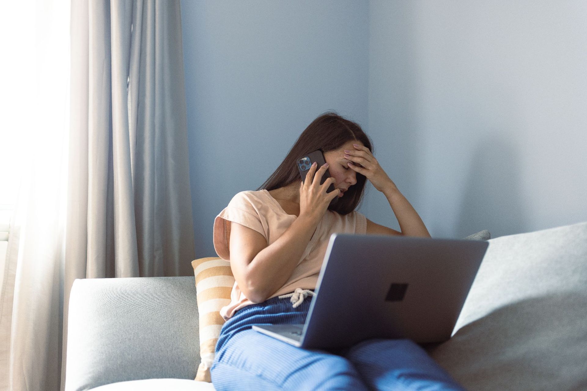 Fix Your Website In Adelaide A woman calling a website company to fix her broken website in Adelaide