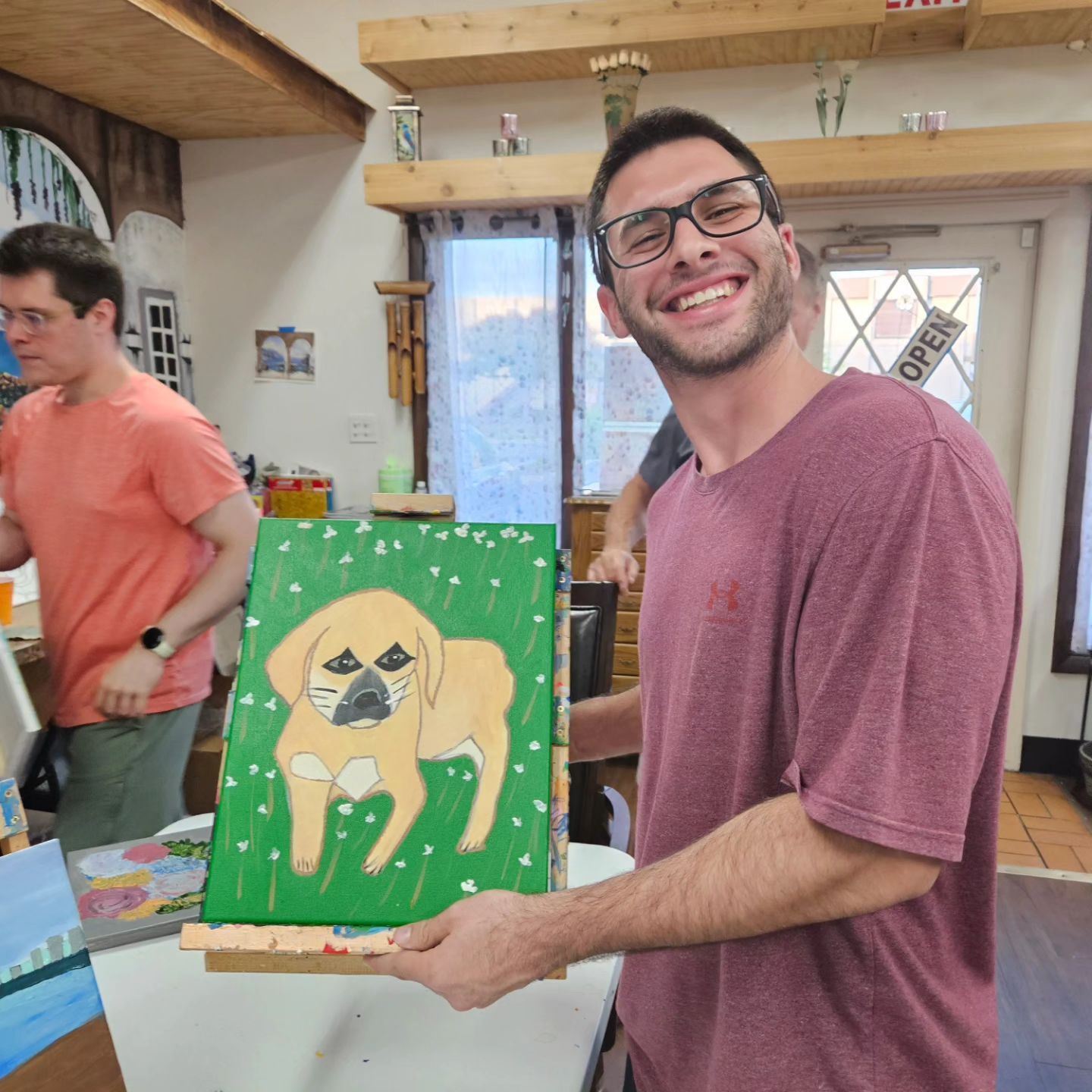 man and his gold dog painting