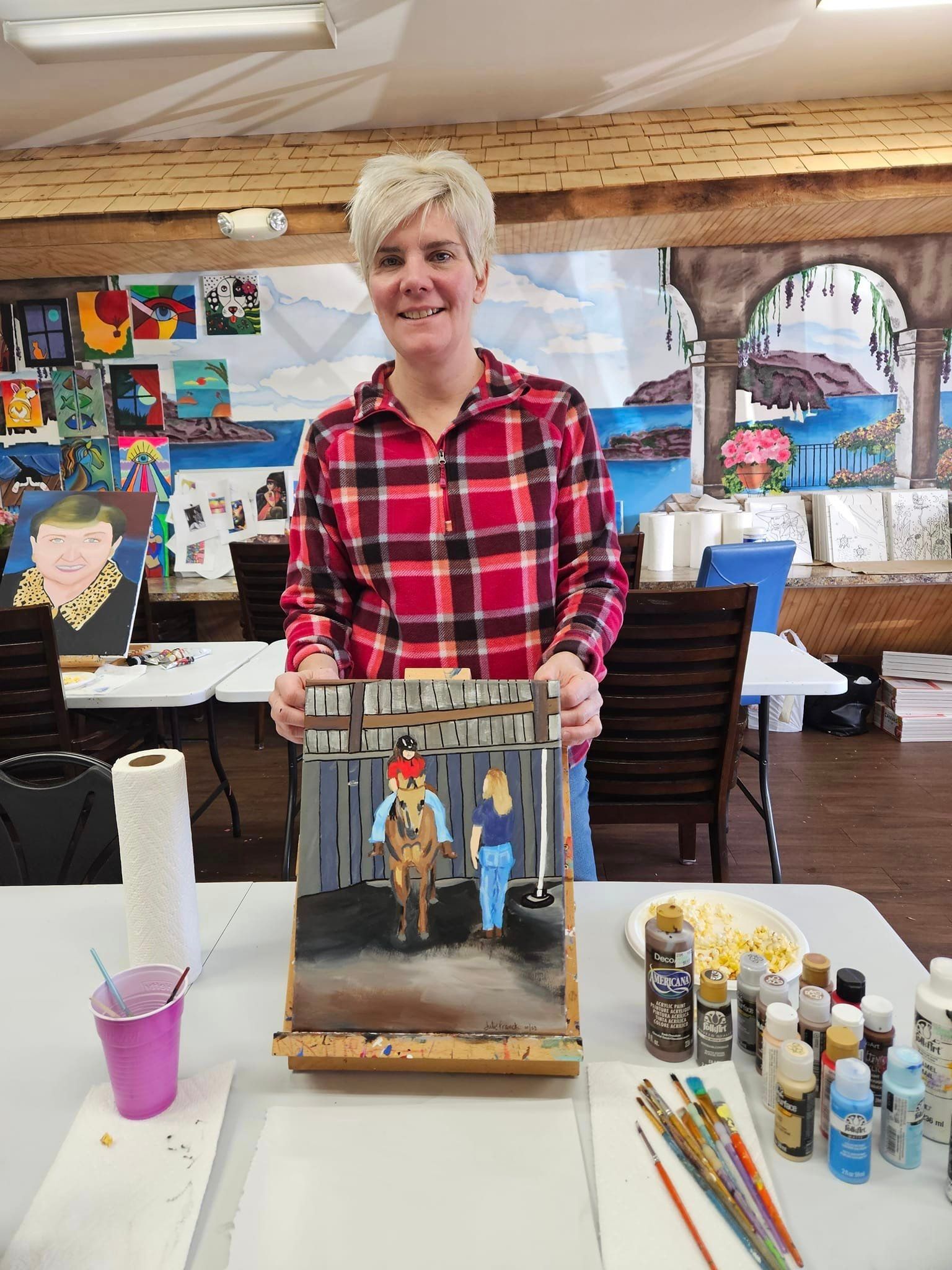 painting of two people's back
