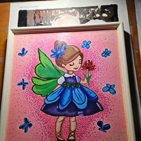 A painting of a fairy in a blue dress holding a flower.