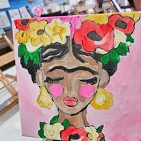 A painting of a woman with flowers in her hair.